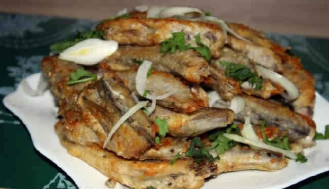 Запечена риба на овочевій подушці